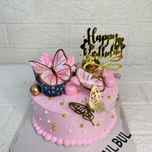 Blush Pink Butterfly Cake with Golden Accents: The Perfect Birthday Treat